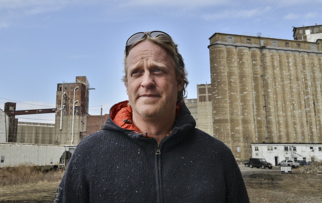 Newell Nussbaumer grew up in Elmwood Village in Buffalo, a vein of the city always considered good.  He now runs Buffalo Rising, an alternative print publication that is now online and is an activist for urban renewal.  John Rennison The Hamilton Spectator 4/7/15