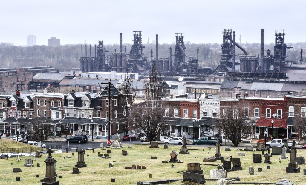 The blast furnaces of Bethlehem Steel can still be seen above the homes where steel workers once lived.  Now the furnaces are part of Steel Stacks, a tourist attraction.  John Rennison, Hamilton Spectator 
